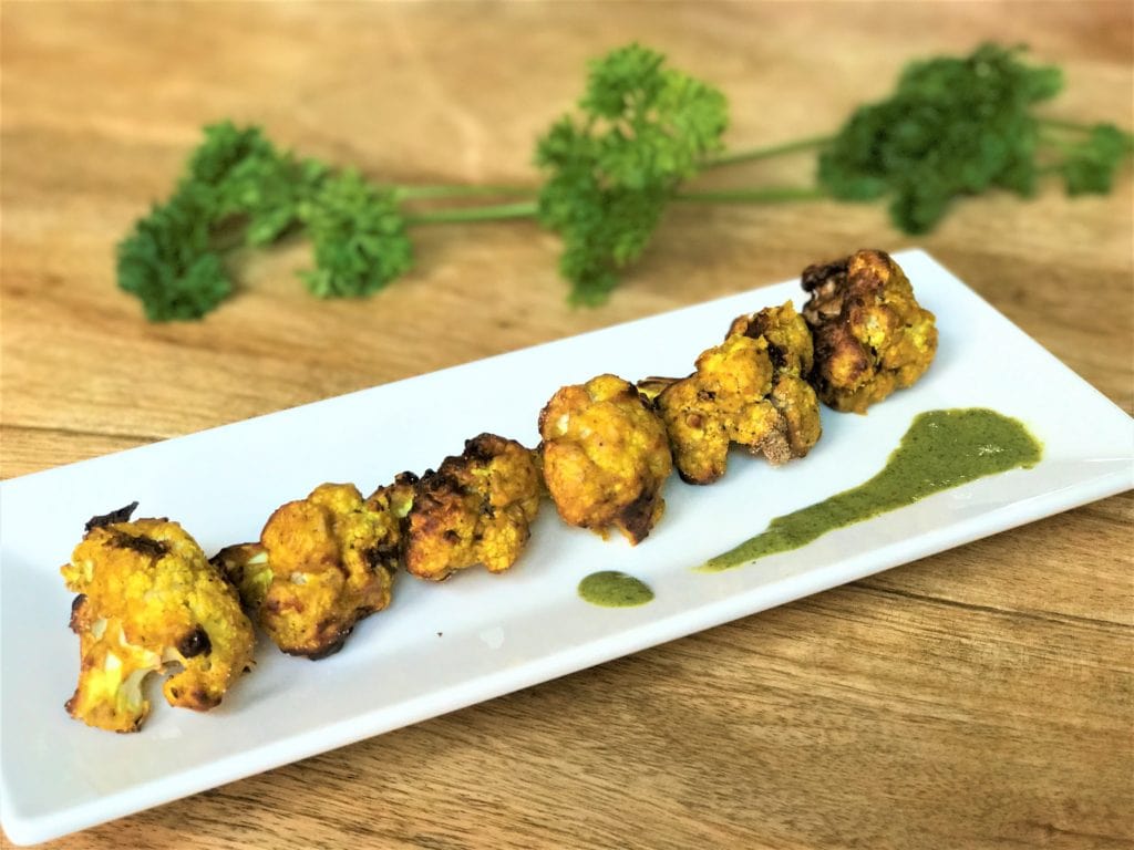 Air Fryer Tandoori Gobi or Cauliflower Tikka Bites is a great snack or appetizer.  Especially for game day or if you are entertaining guests