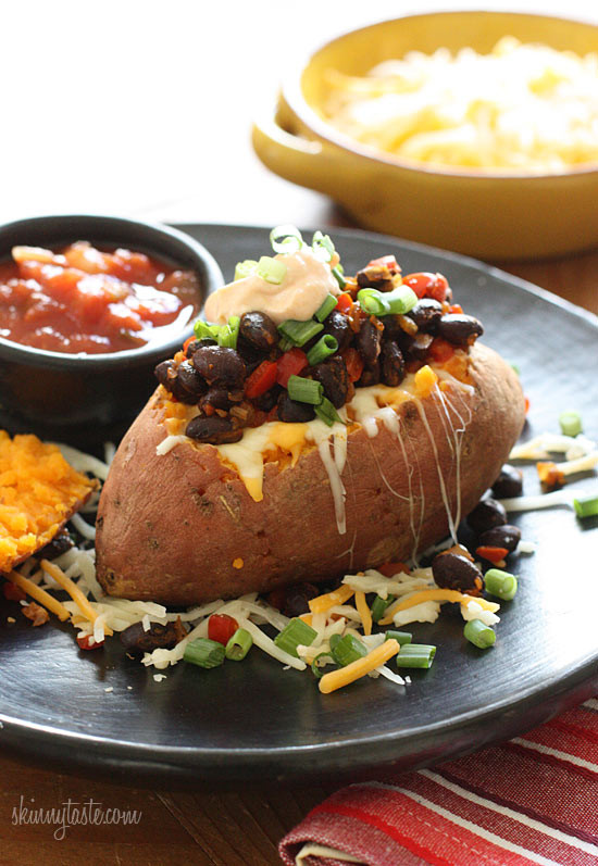 Loaded Vegetarian Baked Sweet Potato are Mexican-inspired, loaded with zesty black beans, melted cheese, salsa with a dollop of cream. What can be better than a 20 minute meal!