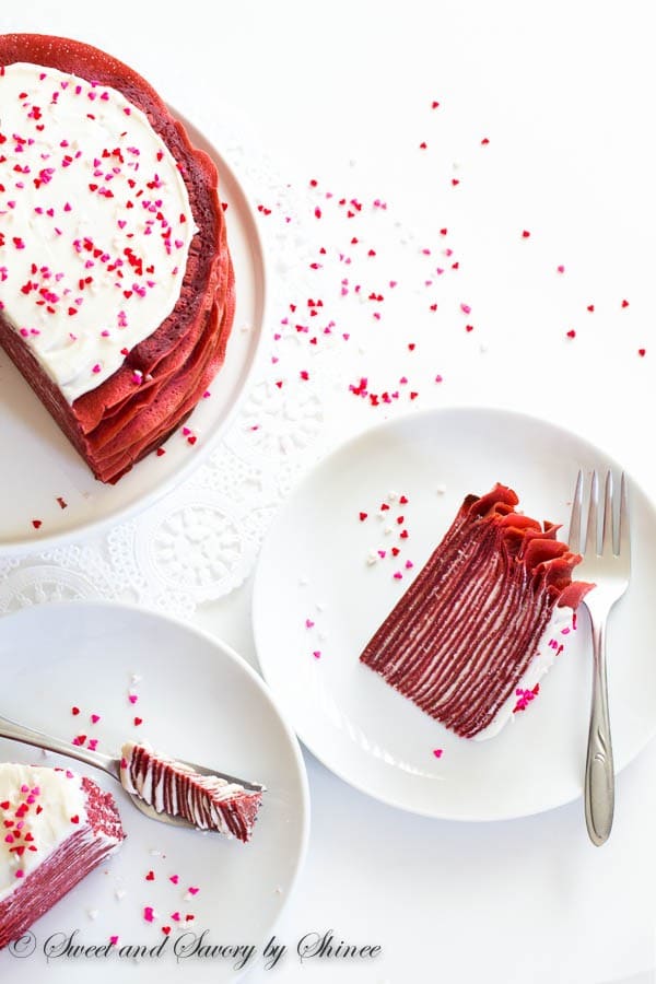 Made with layers of thin red velvet crepes and filled with tangy cream cheese filling, this crepe cake tastes as delicious as it looks! Perfect dessert for Valentineâs Day.