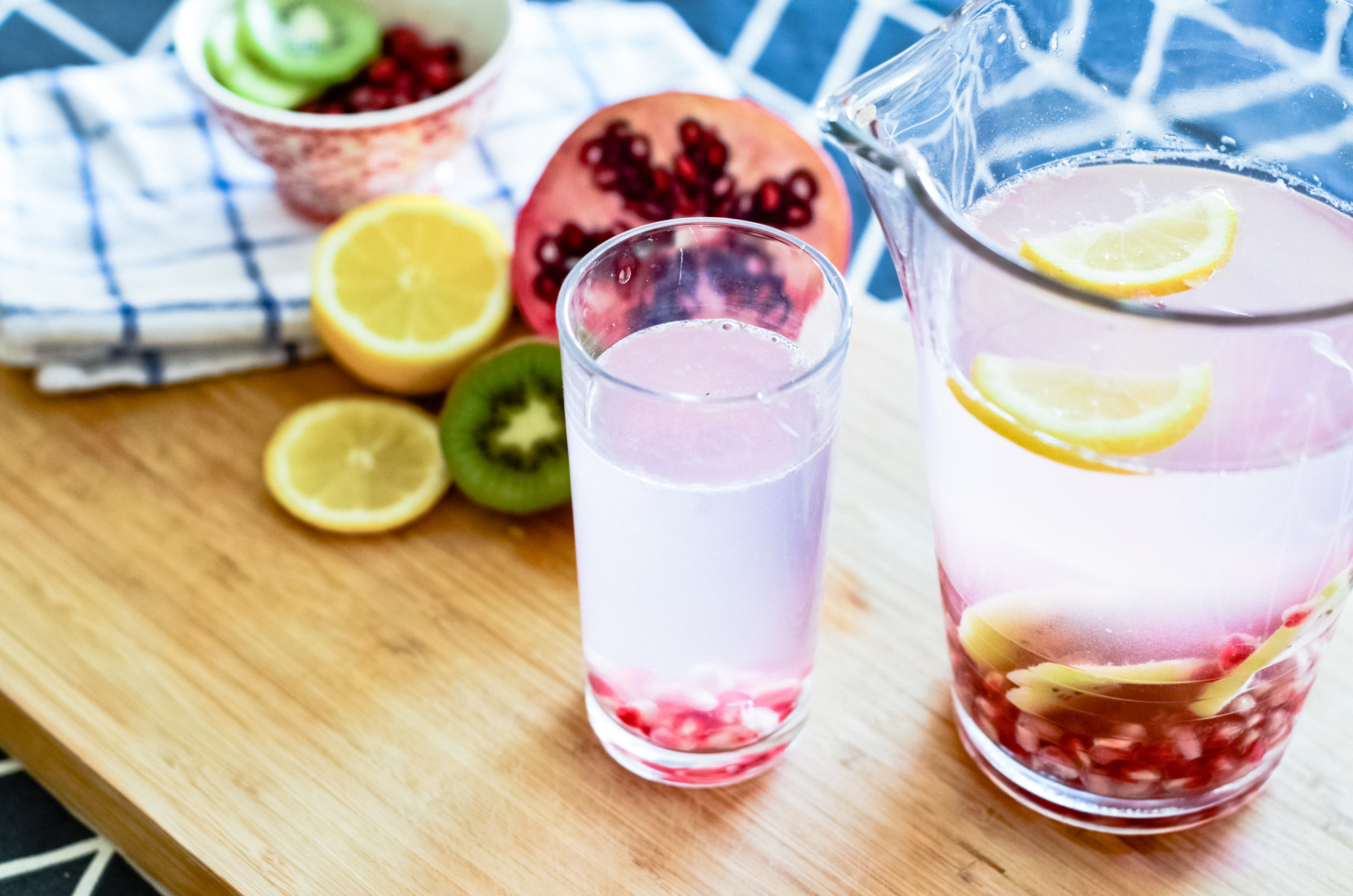 Summer detox drink with lemon pomegranate kiwi