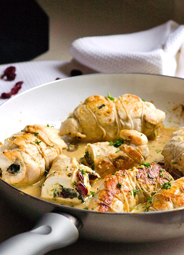 Chicken Stuffed with Brie, Spinach and Cranberries makes healthy simple dinner or a fancy chicken recipe for any occasion. Moist, flavourful and juicy. | ifoodreal.com