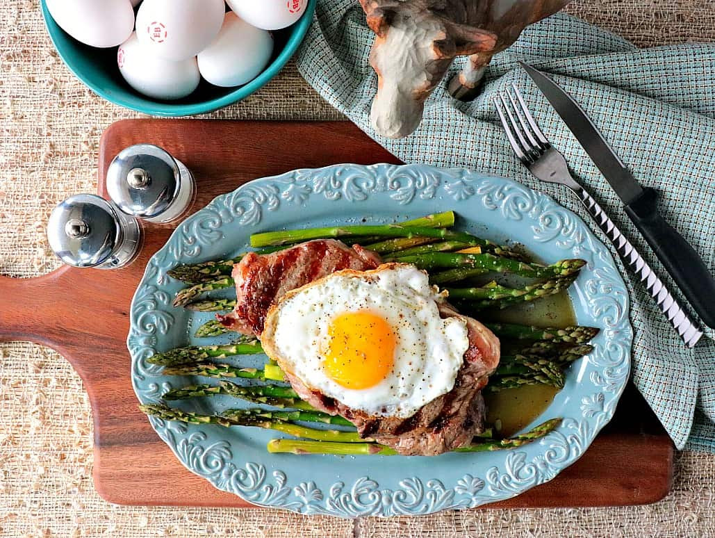 Buttery Rich Keto Steak and Eggs Over Asparagus