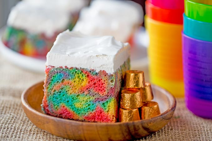 Rainbow Poke Cake With Whipped Cream 1