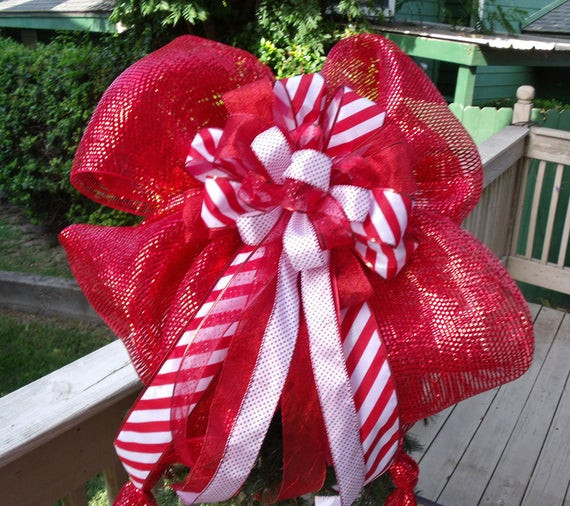Candy Christmas Tree Topper
 Items similar to Big Bow Topper Candy Cane Christmas Tree