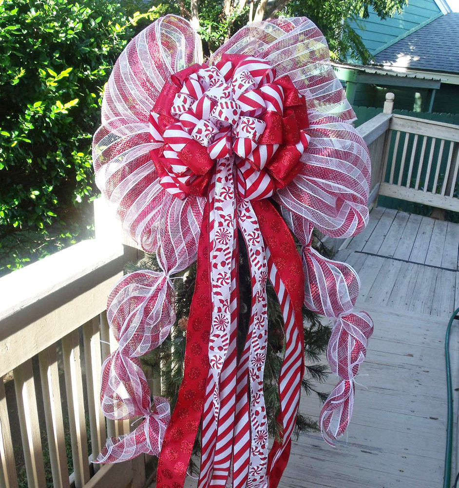Candy Christmas Tree Topper
 Over The Top Candy Cane Christmas Tree Topper by LuxeWreaths