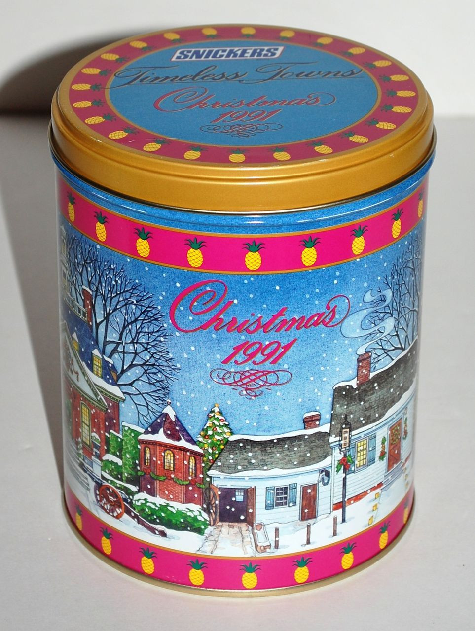Christmas Candy Tins
 1991 Snickers Timeless Towns Christmas Candy Tin from