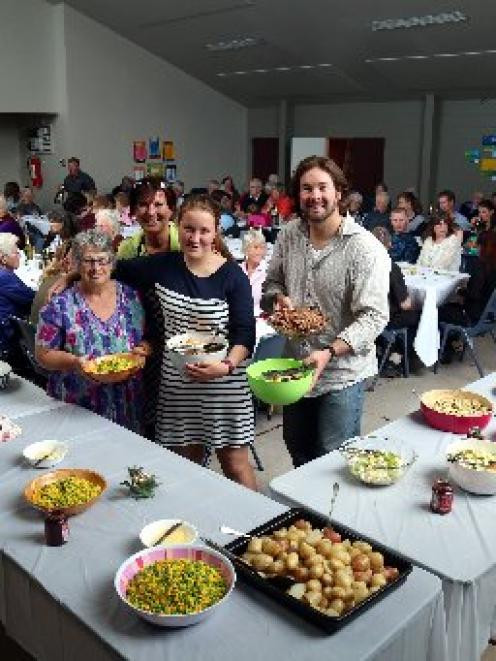 Church Christmas Dinner
 People flock to church dinner