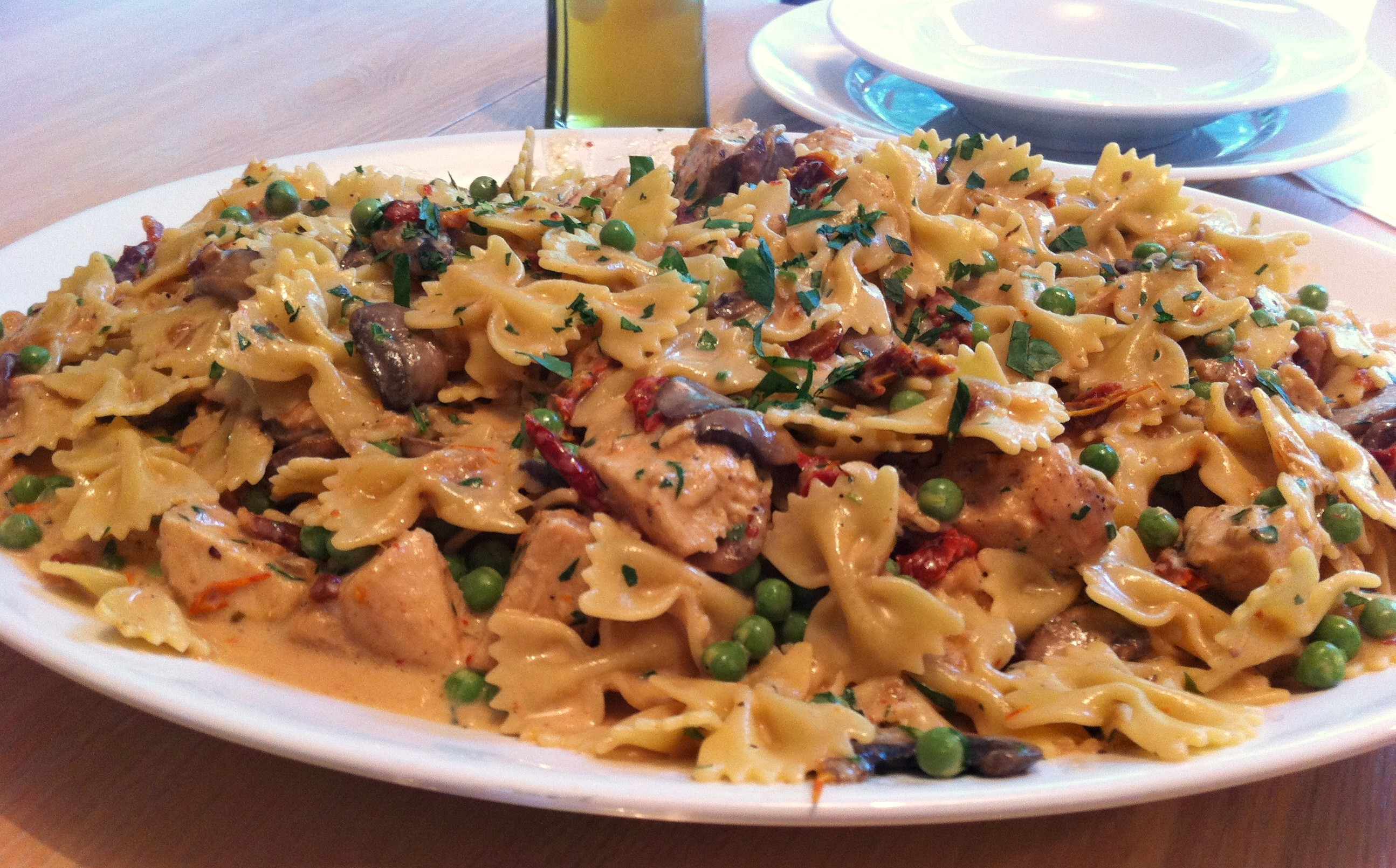 Farfalle With Chicken And Roasted Garlic
 Chicken and Farfalle Pasta in a Roasted Garlic Cream Sauce