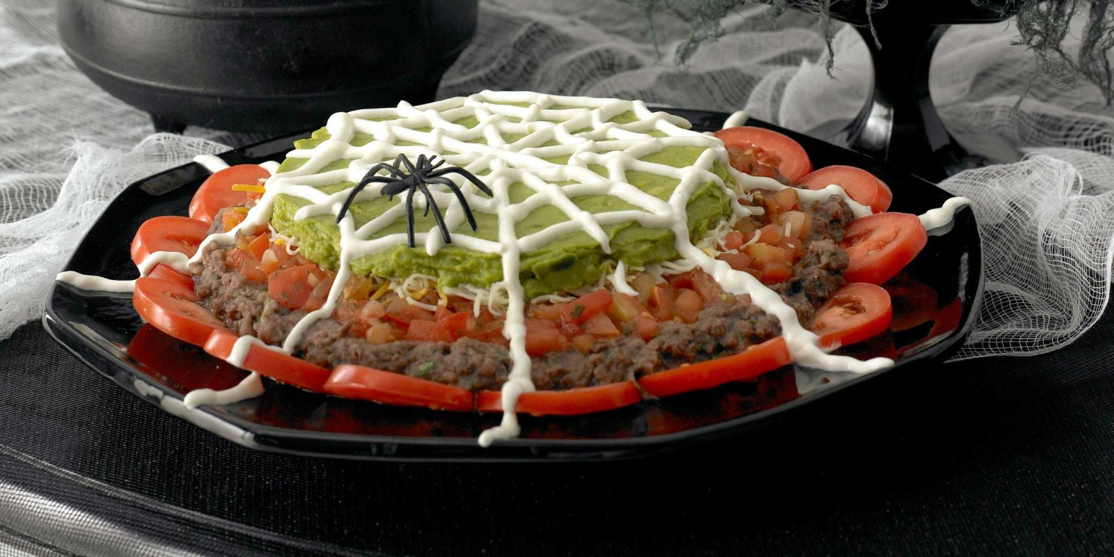 Halloween Dips And Spreads
 Spiderweb Nacho Spread Recipe for Halloween at Woman s Day